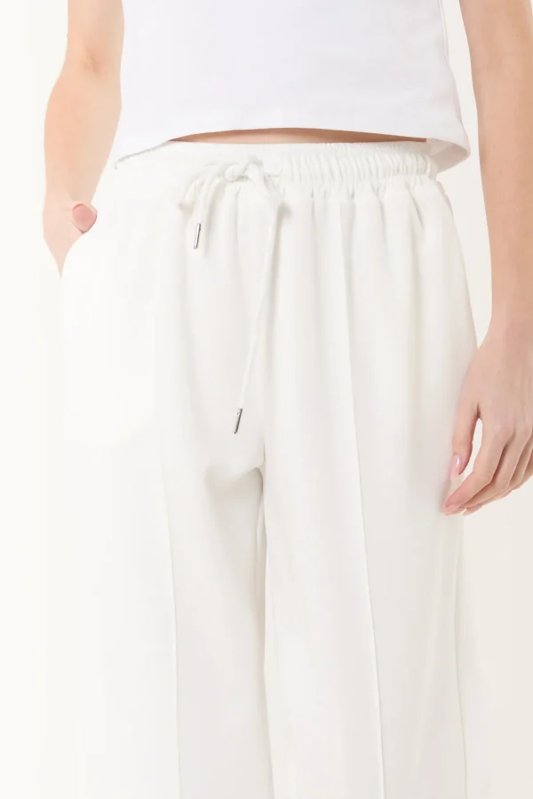 Fran - Crease- Front Sweat Style Trousers in White