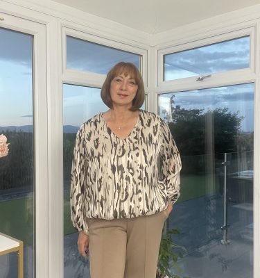 Fran - Glitter Animal Print V-Neck Blouse